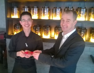 Hutong Operations Director Tony Geary handed staff red pockets containing a gift from the company.
